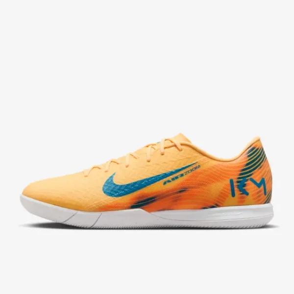 Nike Zoom Mercurial Vapor 16 Academy IC Kylian Mbappé Melon Tint displayed for product discovery in a main photograph