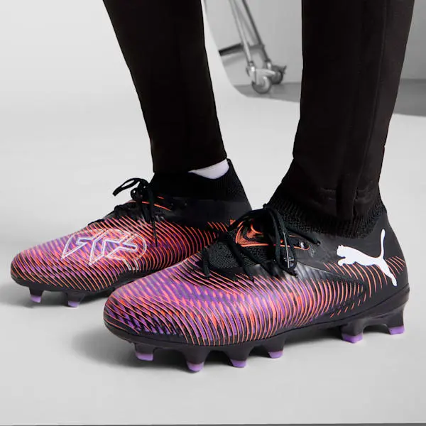 Shopping reference image featuring Puma Future 8 Pro FG/AG Black / White (GS) from the gallery perspective